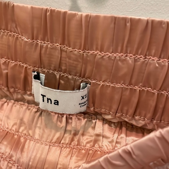 Aritzia TNA - Light Pink Shiny Retro Shorts with Side Stripe - Picture 2 of 3